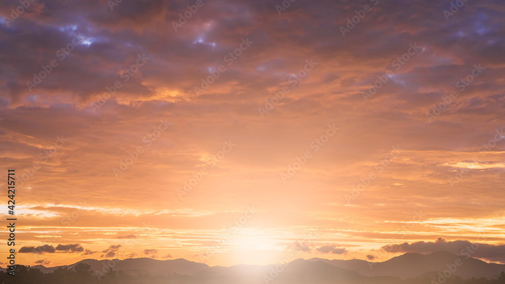sunset sky in the evening with colorful sunlight over mountains sunset sky in the evening with colorful sunlight over mountains
