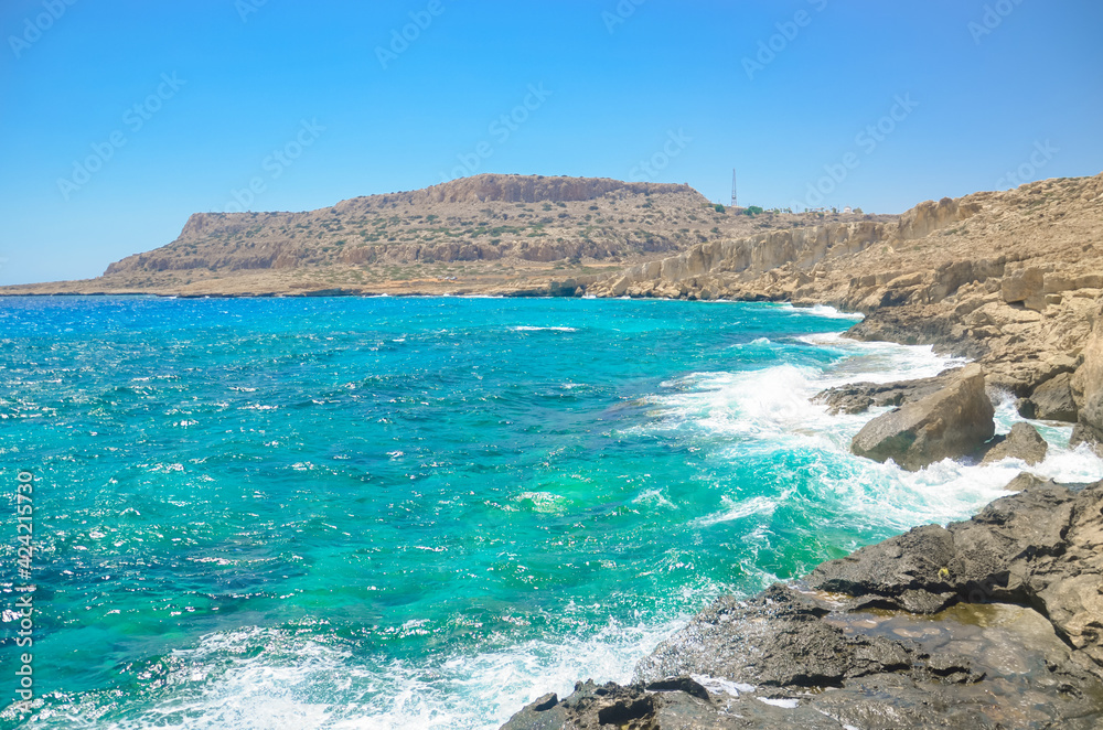 Seascape, sea waves break on the rocks, Cyprus, Cape Kavo Greko