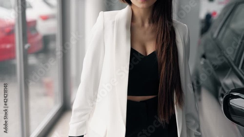 close-up of a white jacket on a sexy girl