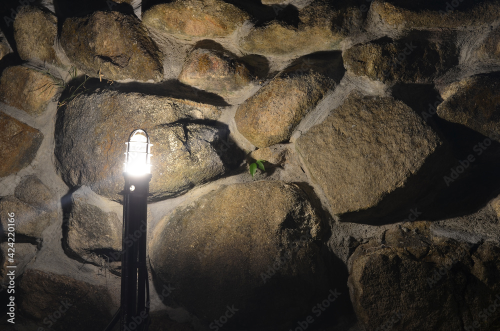 light lamp with stone wall in the mountain. 