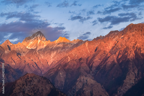 Mesmerizing view of Himalaya during sunset from Kuari pass hiking trail near Auli, Uttarakhand, India. © anjali04