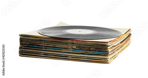 Stack of vintage vinyl records on white background photo