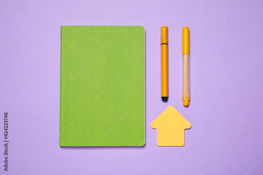 Different school stationery on violet background, flat lay Different school stationery on violet background, flat lay