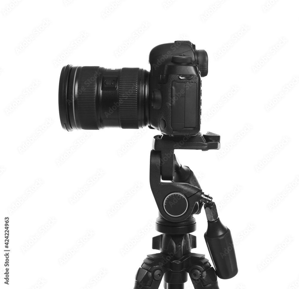 Modern tripod with professional camera isolated on white