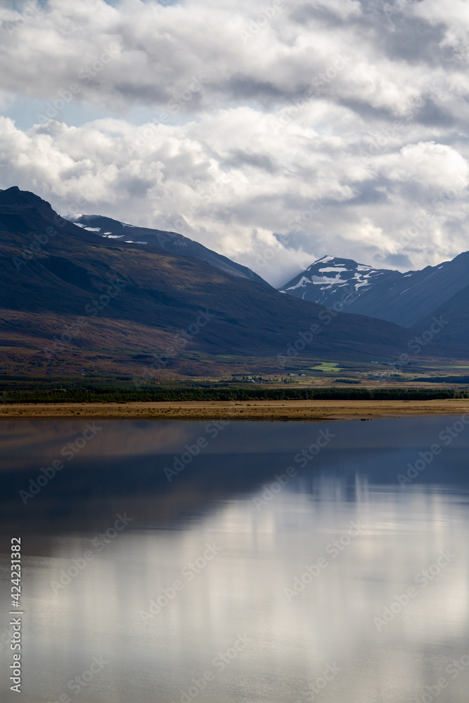 Mountains reflected in a lake. East Iceland landscape