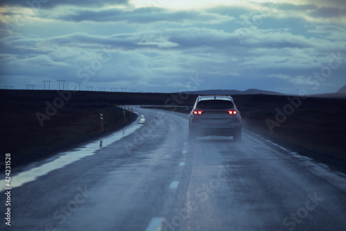 Drive car on road. Iceland travel. View from the inside. Beautiful nature icelandic landscape in the dusk © Ivan Kurmyshov