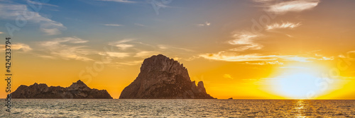 The island of Es Vedra from an Ibiza beach at sunset