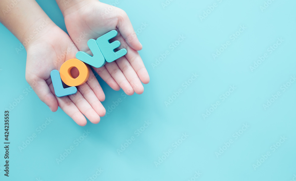 Love word on nurse hands.Caregiver to senior old elderly people.Medical health care.Nursing day.Volunteer, Kind and love.Donate and charity.Happy mother day card on blue background.Love card.Support. Love word on nurse hands.Caregiver to senior old elderly people.Medical health care.Nursing day.Volunteer, Kind and love.Donate and charity.Happy mother day card on blue background.Love card.Support.