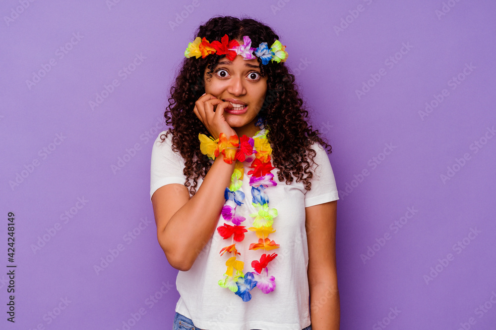 Young Hawaiian woman isolated on purple background biting fingernails, nervous and very anxious. Young Hawaiian woman isolated on purple background biting fingernails, nervous and very anxious.