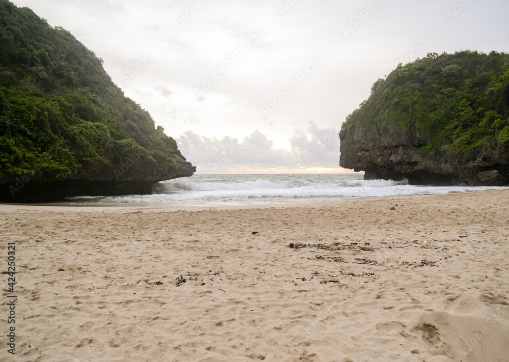 Dusk view in the beach. Greweng Beach, Gunung Kidul Regency, Yogyakarta, Indonesia. Dusk view in the beach. Greweng Beach, Gunung Kidul Regency, Yogyakarta, Indonesia.