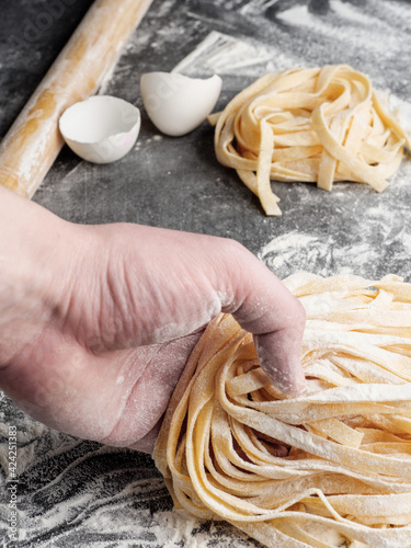 Homemade traditional Italian fettuccine pasta.