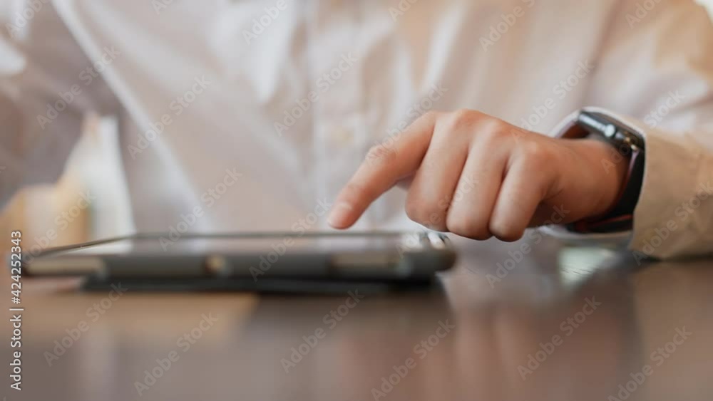 slow motion scene man hand using tablet screen to working about social media marketing for internet network technology and business concept slow motion scene man hand using tablet screen to working about social media marketing for internet network technology and business concept