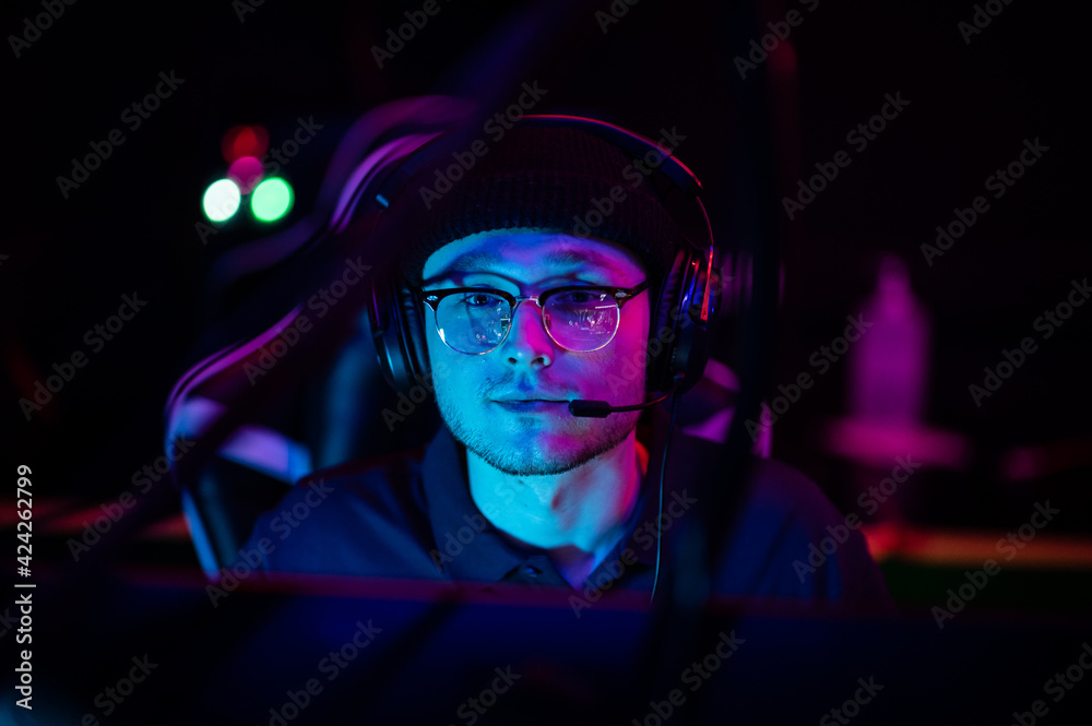 Closeup of the face of a professional video game player at an esports tournament. A