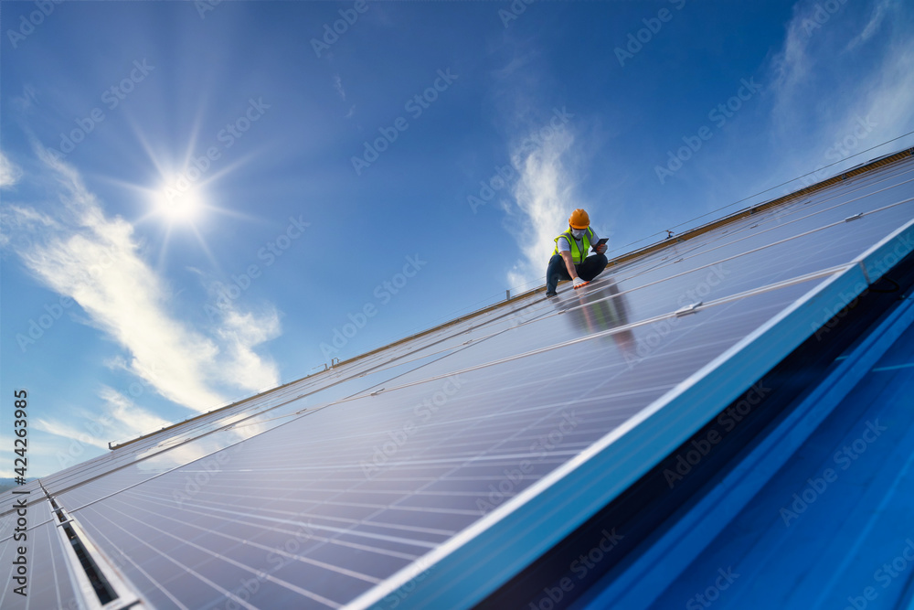 solar energy, engineering team working on roof checking and maintenance in solar power plant , solar power plant to innovation of green energy for life solar energy, engineering team working on roof checking and maintenance in solar power plant , solar power plant to innovation of green energy for life