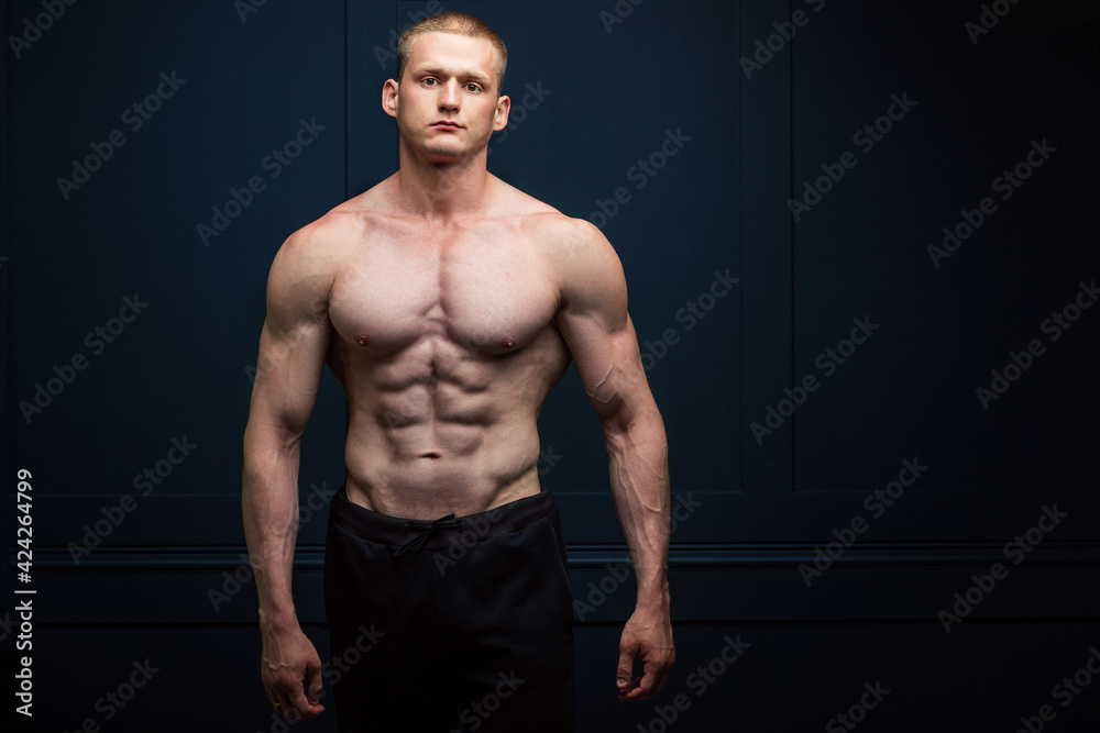 a young athlete with a beautiful and muscular figure a young athlete with a beautiful and muscular figure