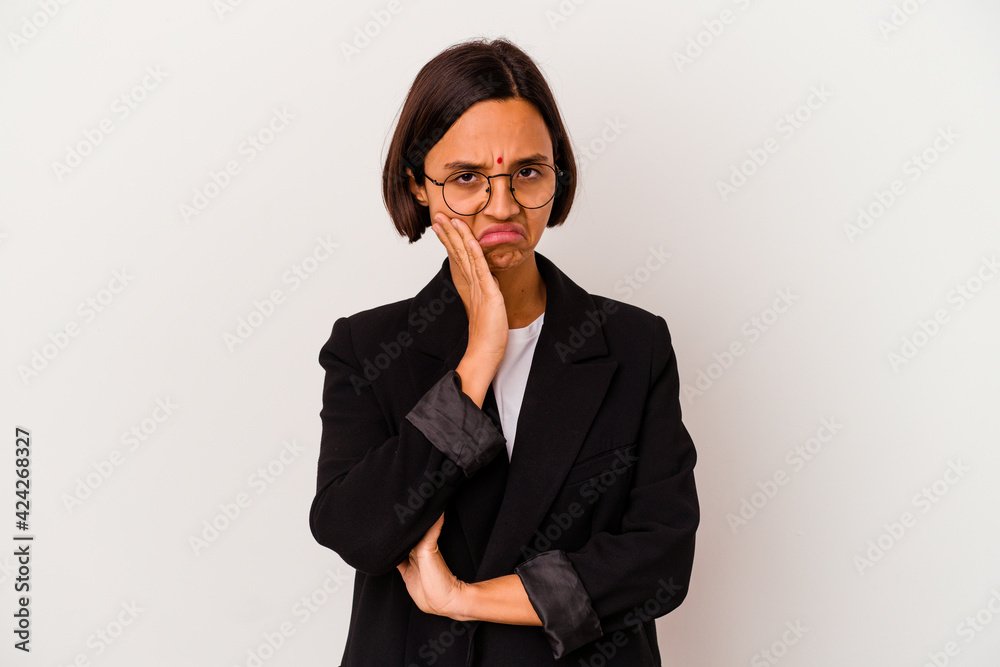 Young business Indian woman isolated on white background who is bored, fatigued and need a relax day.