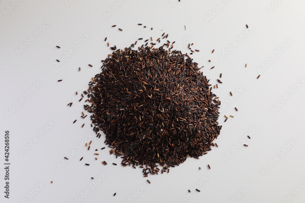 Raw organic riceberry rice in close up Raw organic riceberry rice in close up