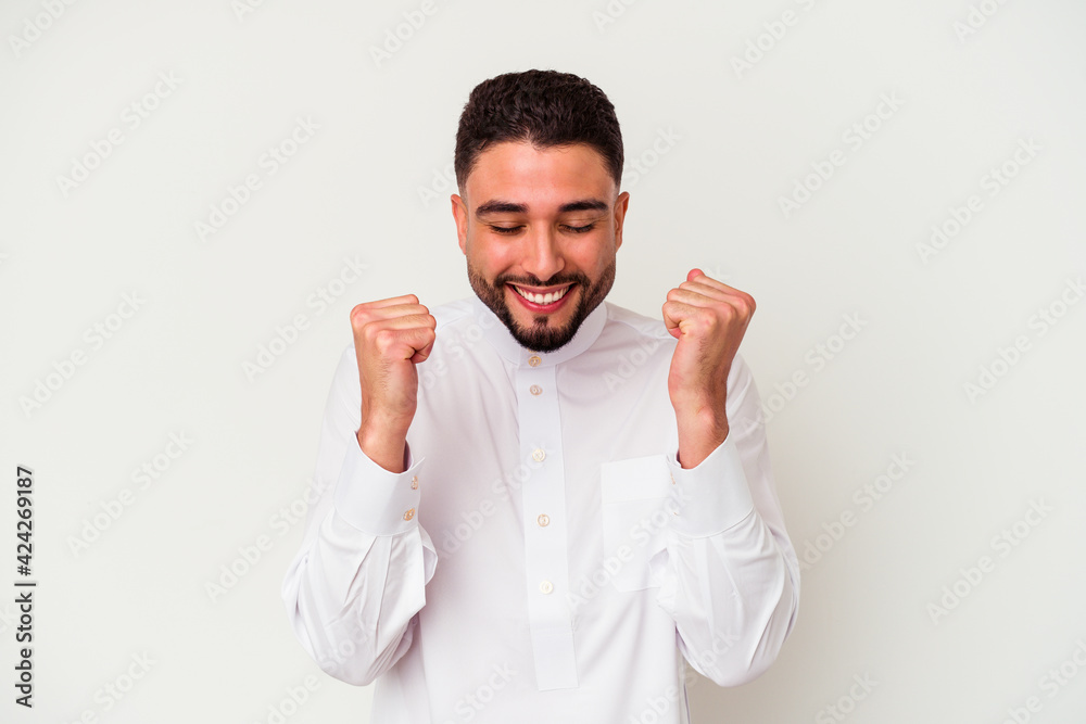 Young arab man wearing typical arab clothes isolated on white background Young arab man wearing typical arab clothes isolated on white background
