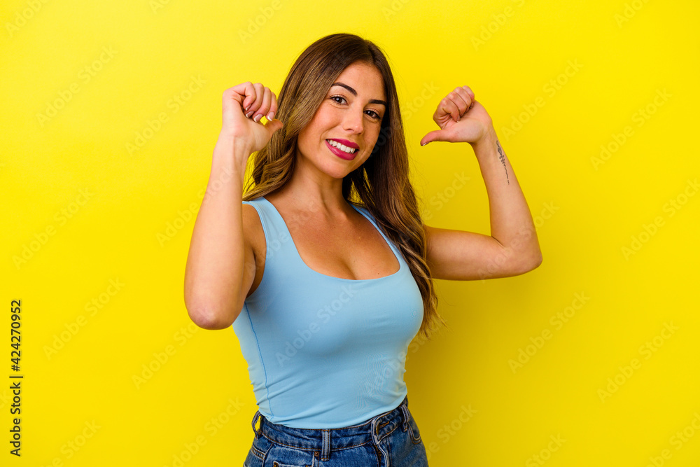 Young caucasian woman isolated on yellow background Young caucasian woman isolated on yellow background