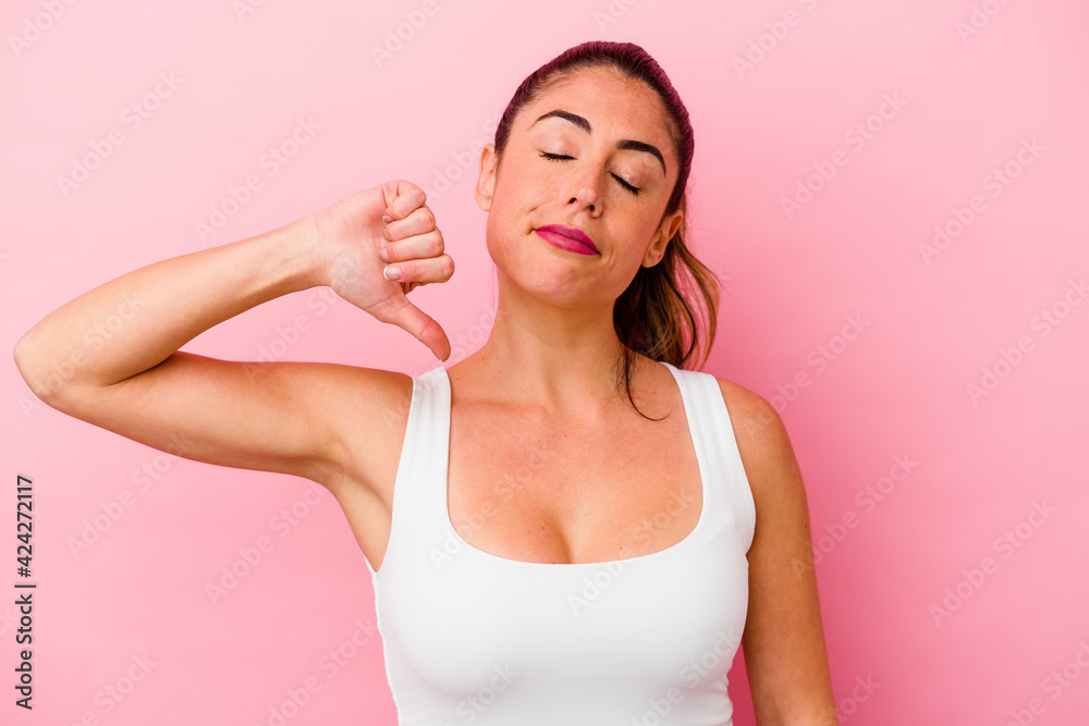 Young caucasian woman isolated on pink background Young caucasian woman isolated on pink background
