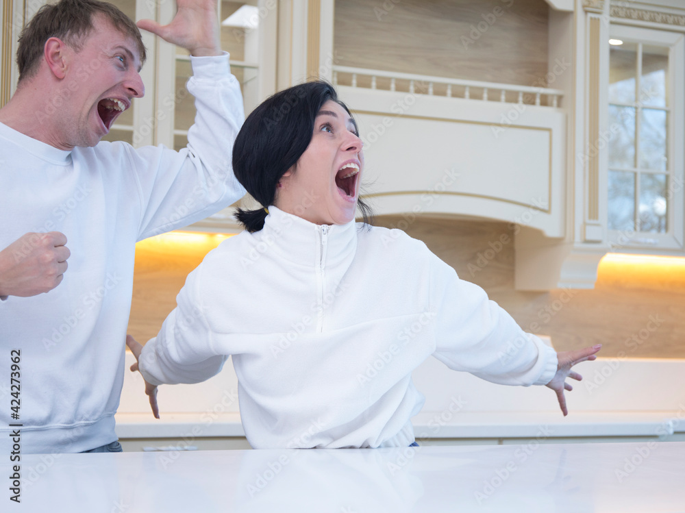 Couple in love. Kitchen couple. Happy day. Emotion. Fun. Couple in love. Kitchen couple. Happy day. Emotion. Fun.