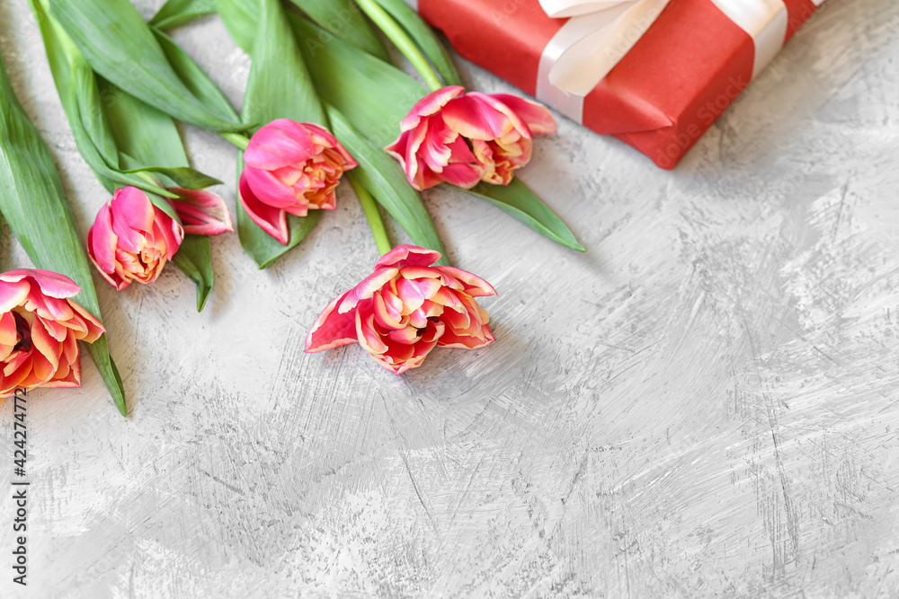Fresh pink tulips with presents, place for text Fresh pink tulips with presents, place for text