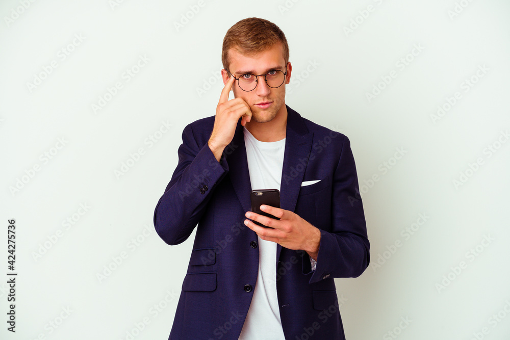 Young business man holding a phone isolated on white background Young business man holding a phone isolated on white background