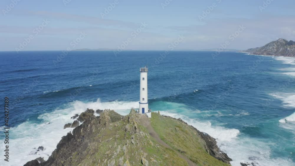 Lighthouse in Cape Home and Cies Islands Pontevedra Galicia Spain Lighthouse in Cape Home and Cies Islands Pontevedra Galicia Spain