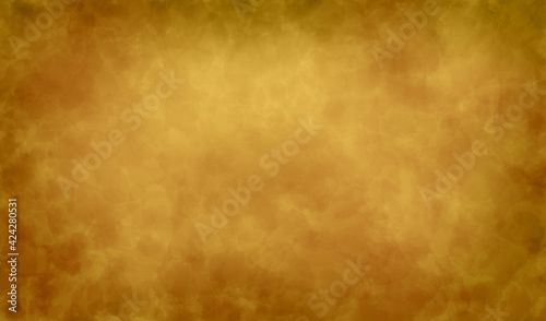 Brown grunge old parchment paper or suede texture background with aged stained pattern surface and gradient gold yellow golden colors in abstract wallpaper design