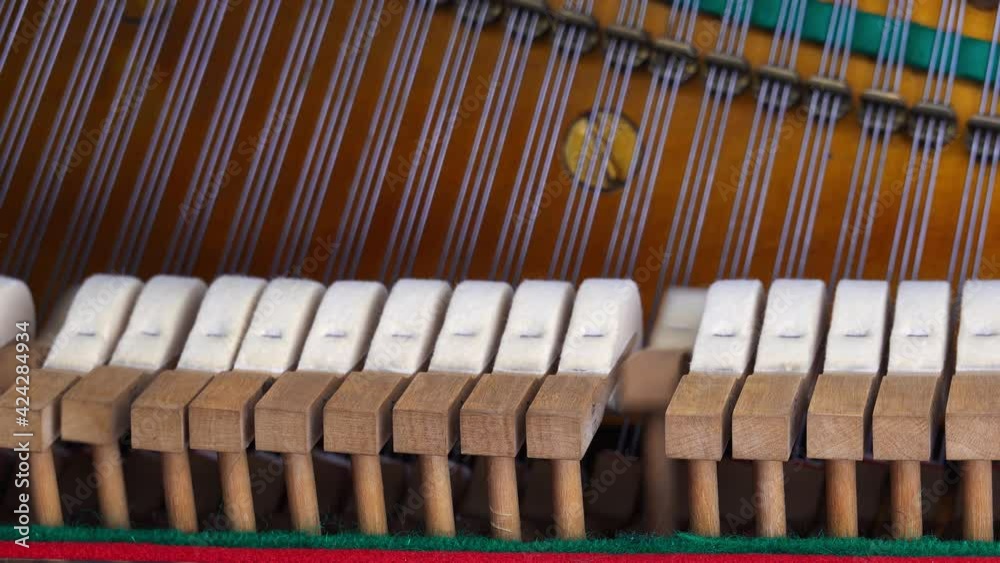 Old Traditional Piano Hammers Hitting Strings While Playing Classical Music Piece Stock Video