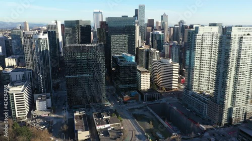 Cinematic aerial drone clip of downtown Seattle, Pike Pine Retail Core and Central Business District with skyscrapers, high-rise office and residential buildings in Seattle, Washington photo