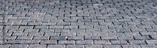 textured background of old paving stone 