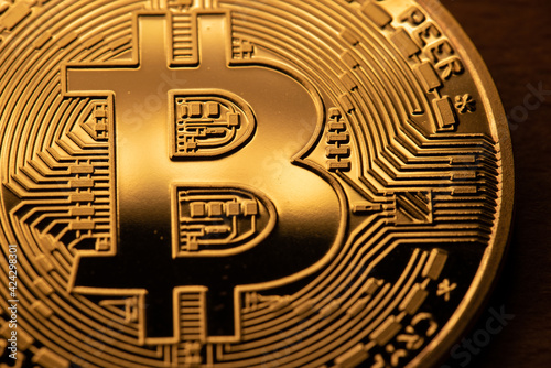 Bitcoin coins closeup. Golden Crypto coins. Cryptocurrency and Blockchain concept. Digital Gold