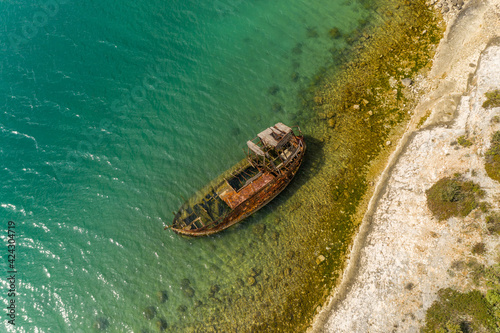 Aerial view of sunken ship in Luka beach, Rakalj, Croatia.