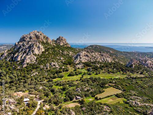 Veduta aerea della famosa cittadina di San Pantaleo con attorno le maestose montagne granitiche photo