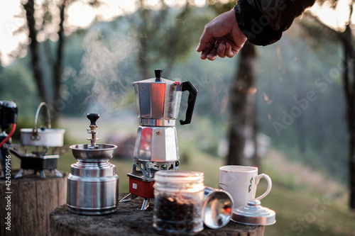 Travel, camping and dripping coffee in the mountains of northern Thailand in the morning with beautiful views.
 photo