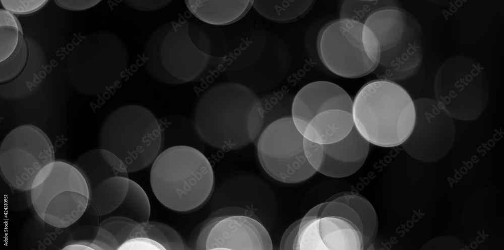Black and white glitter light effect bokeh on circle pattern background. defocus Black and white glitter light effect bokeh on circle pattern background. defocus