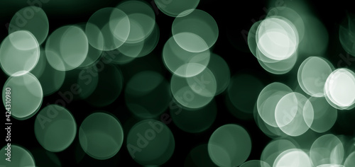 Christmas light effects on green bokeh abstract background