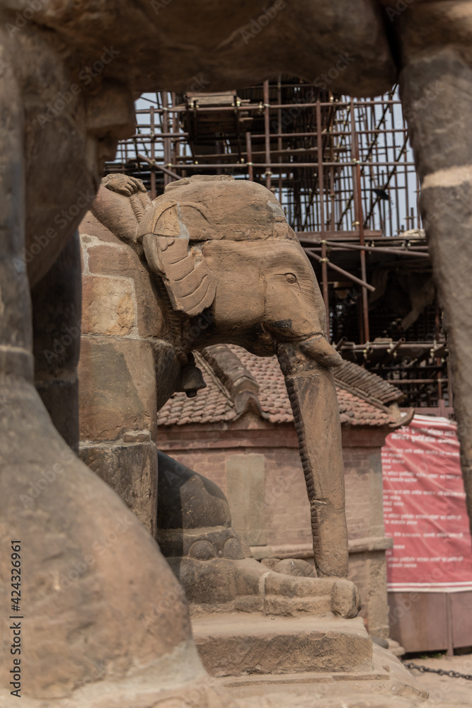 Statue of an elephant at the entrance stairs to one of the temple located at Patan Durbar Square, Patan, Nepal