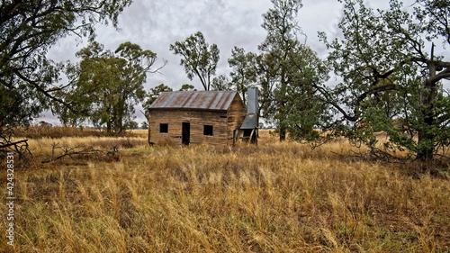 Old House Among Trees and Paddocks