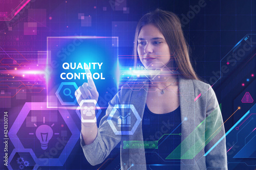 Business, Technology, Internet and network concept. Young businessman working on a virtual screen of the future and sees the inscription: Quality control