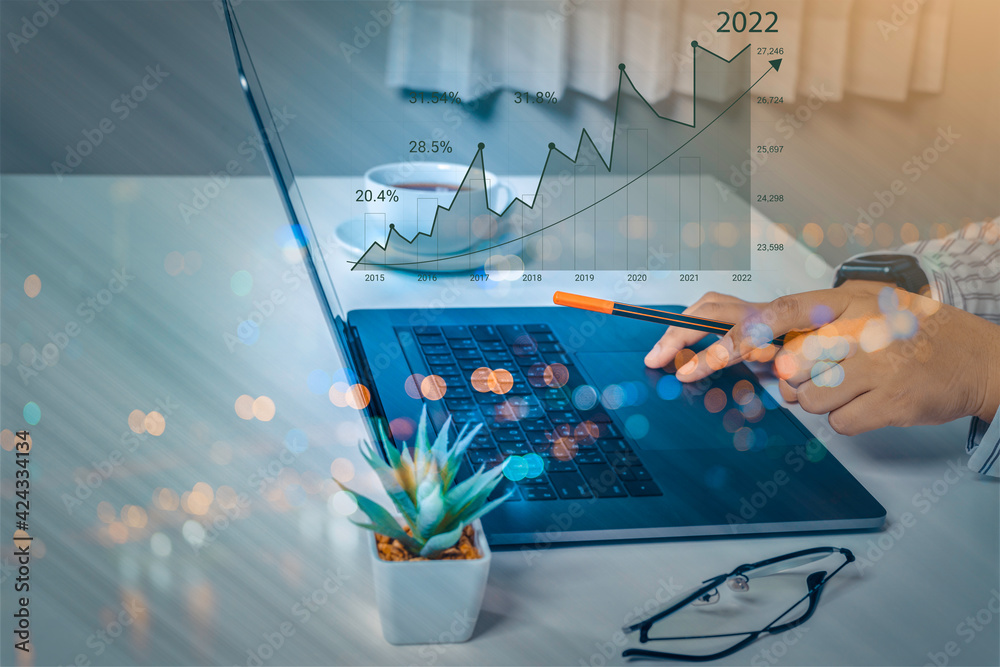 AR (Augmented reality) financial charts showing growing revenue in 2022 ...
