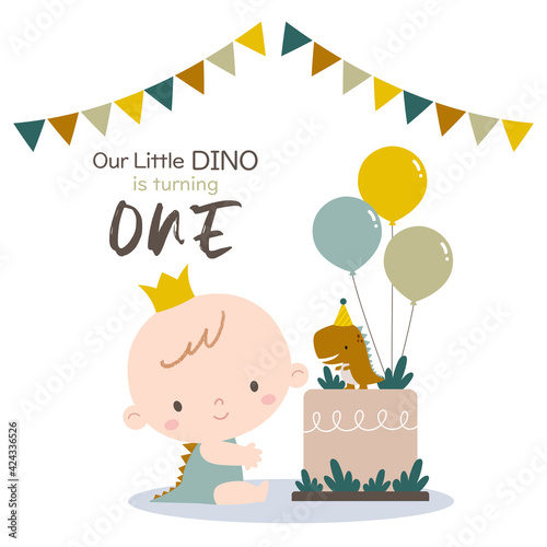 Baby boy celebrating his first birthday with birthday cake, balloons, and garlands. Boy's first birthday celebration with dinosaur theme.