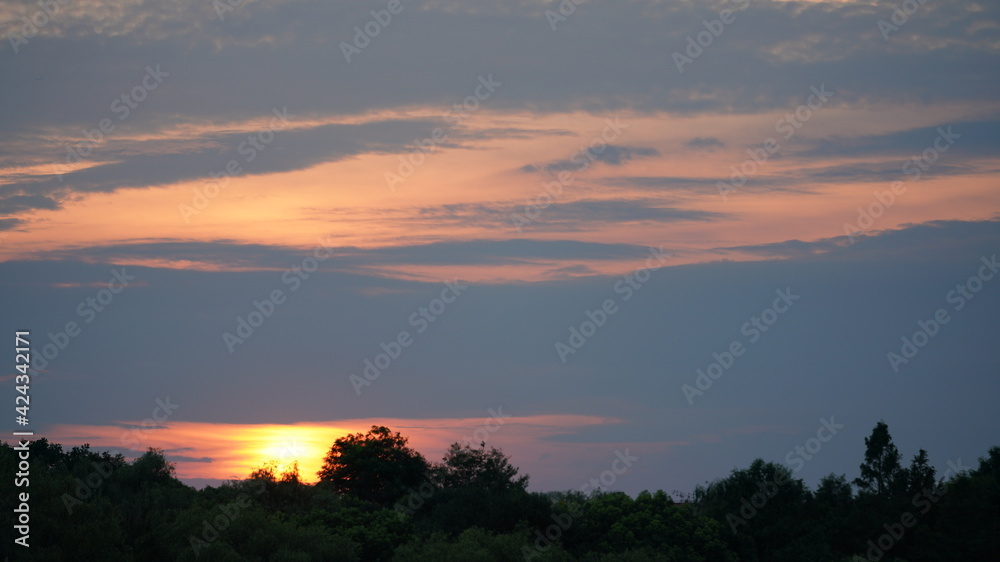 The beautiful sunset view in the city with the colorful clouds sky The beautiful sunset view in the city with the colorful clouds sky
