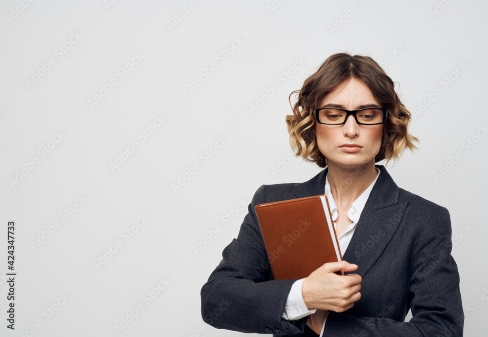 Business woman classic suit book bound finance model Business woman classic suit book bound finance model