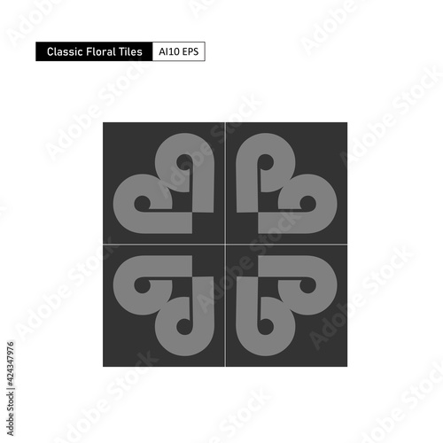 Classic floral tiles in dark colors to complement the floors of an industrial themed building 