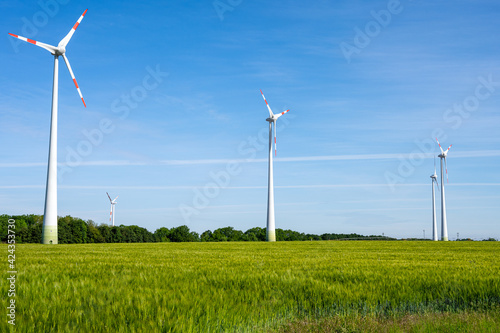 Wind turbines in a grain field seen in Germany