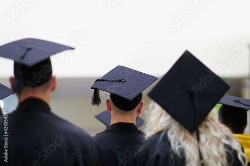 Group of diverse international graduating students celebrating