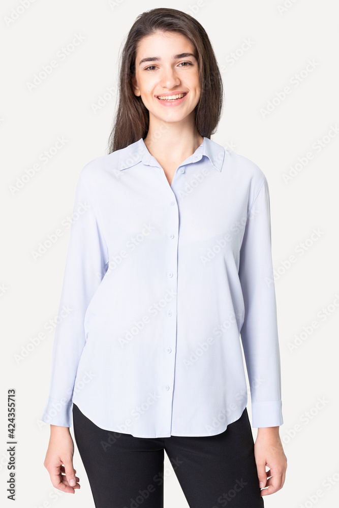 Beautiful woman wearing blue shirt apparel studio shoot Beautiful woman wearing blue shirt apparel studio shoot