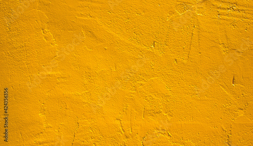 Golden plaster wall texture